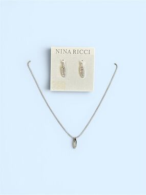 Nina Ricci Silver-toned Crystal Pendant Necklace and Hoop Earrings Set